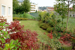 Tricamere con loggia e giardino privato